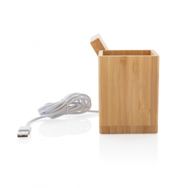 Logo trade promotional giveaways image of: Calgary bamboo 10W wireless charger