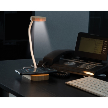 Logotrade ärikingitused pilt: Juhtmeta laadijaga laualampTomsk