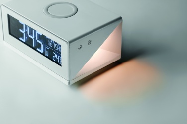 Лого трейд бизнес-подарки фото: Часы с беспроводной зарядкой